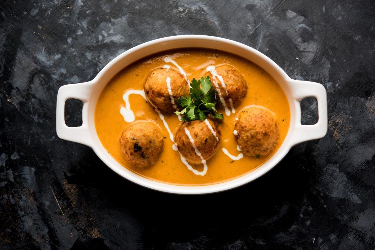 Capital O 60233 Brij Ki Rasoi Deluxe Hotel Lucknow Esterno foto